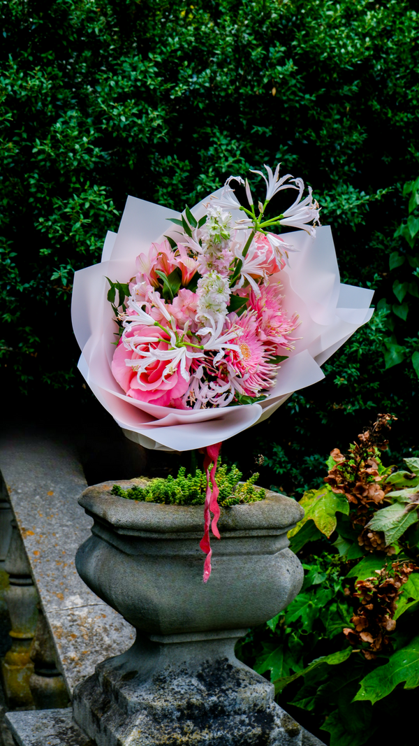 Customizable bouquet with options for three elegant color schemes and two sizes, designed for any occasion. Perfect for celebrating special moments, expressing feelings, or brightening someone's day. Includes an option to add a personalized love note at checkout for a special touch.